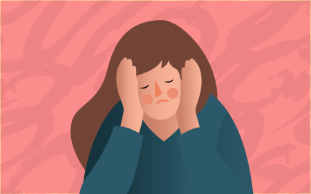 graphic woman holding hands against head